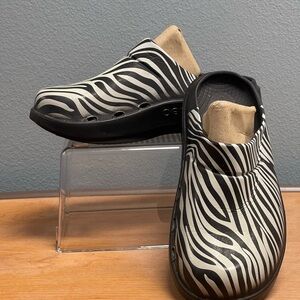 OOFOS Black and White Zebra Slip-On Clog
